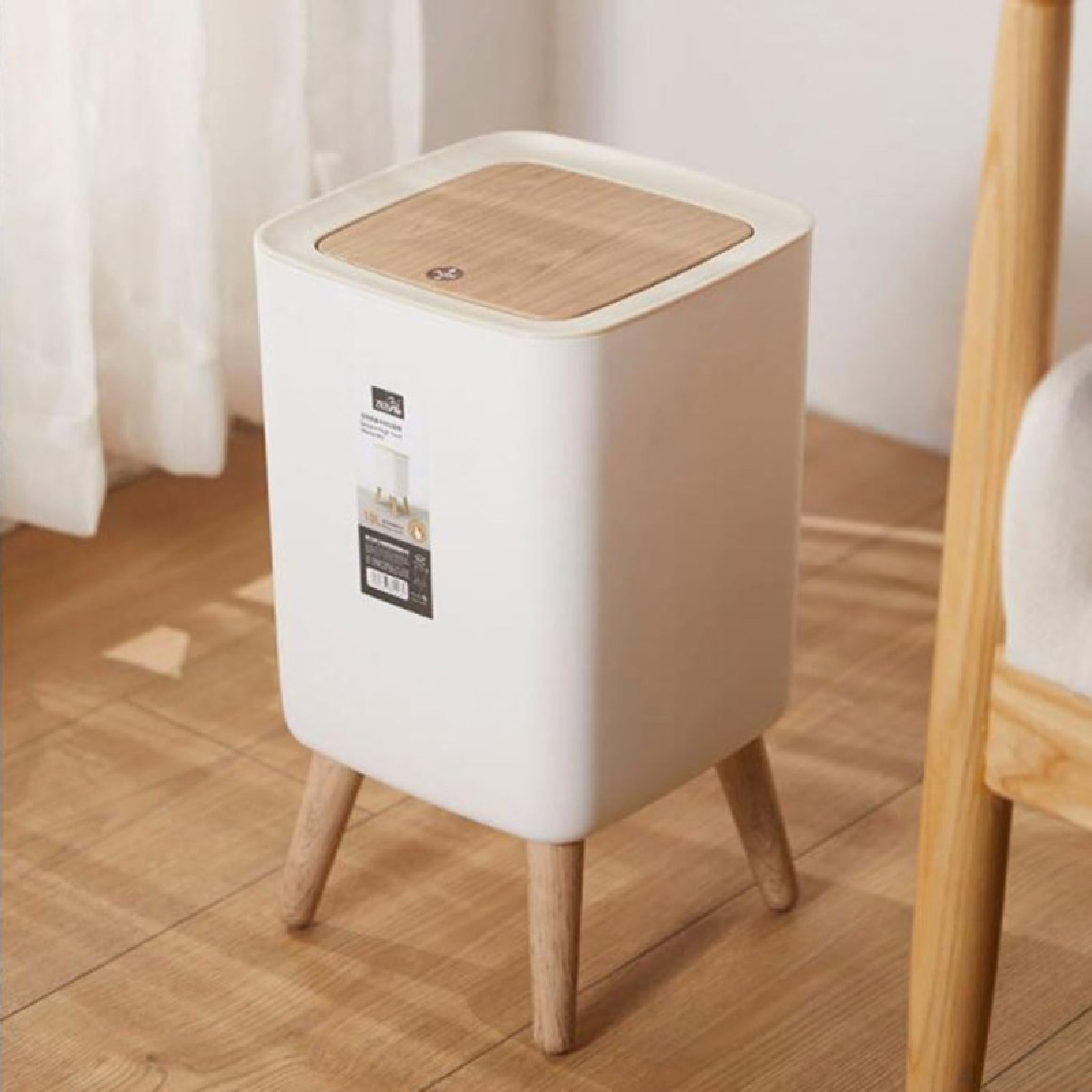 Zidello modern push-open trash bin with wooden lid and legs, compact 10L stylish waste bin for kitchen, bathroom, or office use, durable plastic body with hands-free lid design.