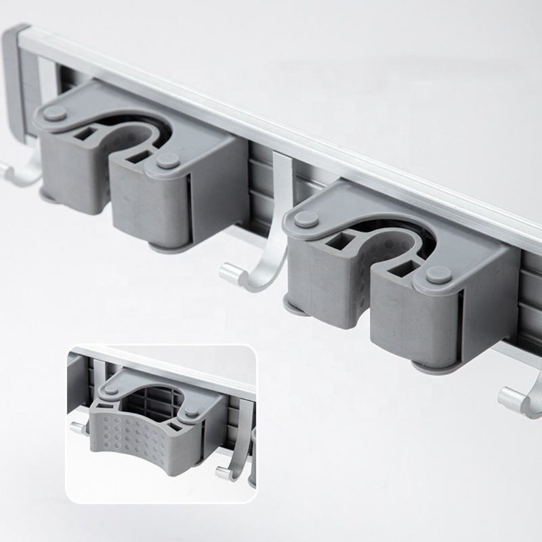 Zidello wall-mounted mop and broom holder with durable grip clips and hanging hooks for organizing cleaning tools, space-saving design, strong hold, ideal for kitchen, bathroom, or utility area