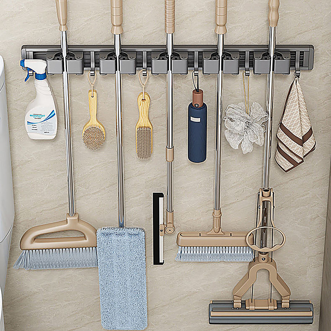 Zidello wall-mounted mop and broom holder with durable grip clips and hanging hooks for organizing cleaning tools, space-saving design, strong hold, ideal for kitchen, bathroom, or utility area
