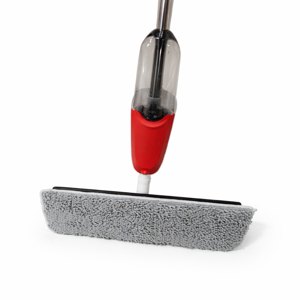 Zidello heavy-duty spray mop with refillable water bottle and flat microfiber mop head spraying cleaning solution on a wooden floor for easy home floor cleaning.