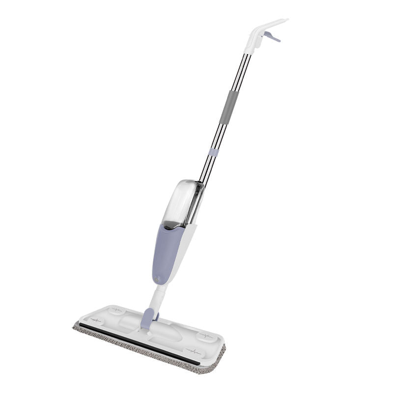 Zidello heavy-duty spray mop with refillable water bottle and flat microfiber mop head spraying cleaning solution on a wooden floor for easy home floor cleaning.