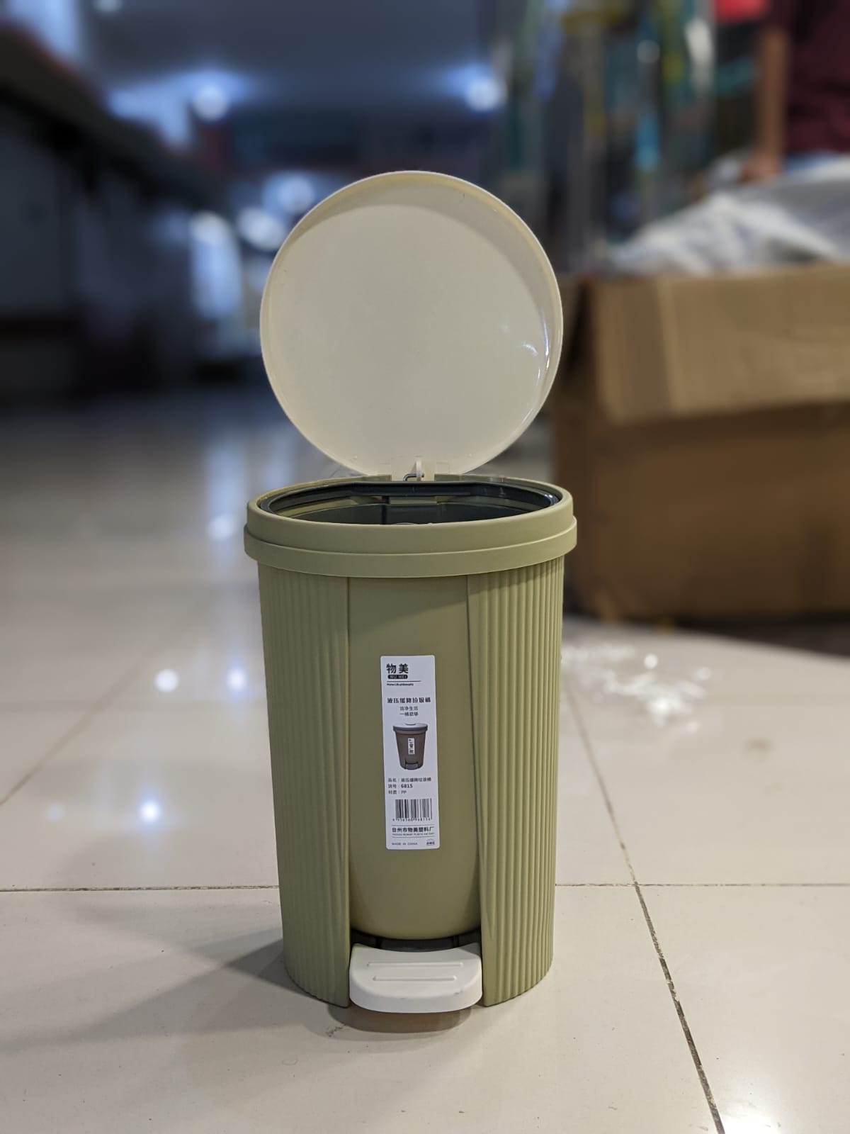 Zidello oval design soft-closing pedal dustbin with modern ribbed body, durable plastic build, and hands-free foot pedal lid for hygienic use in home or office interiors.