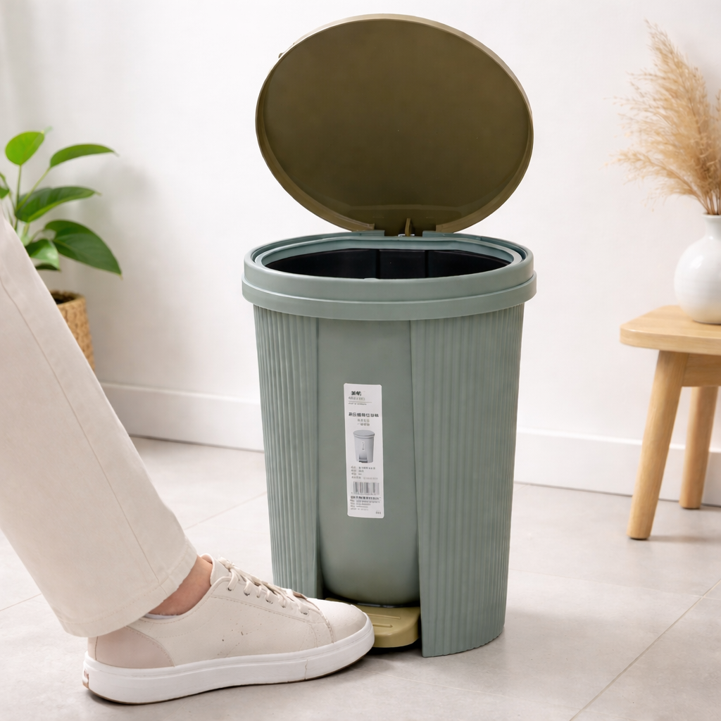 Zidello oval design soft-closing pedal dustbin with modern ribbed body, durable plastic build, and hands-free foot pedal lid for hygienic use in home or office interiors.