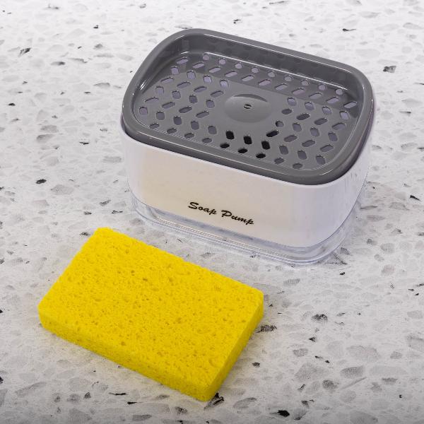 Soap dispenser with built-in sponge holder for a clutter-free sink.